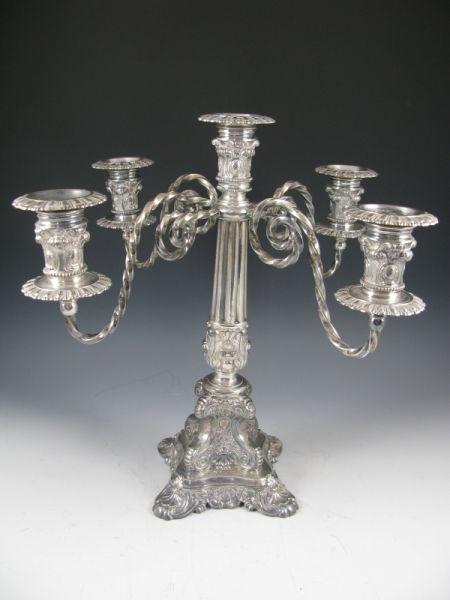 Appraisal: Meriden Silverplate Rococo Style Candelabra five scrolled arms emerge from