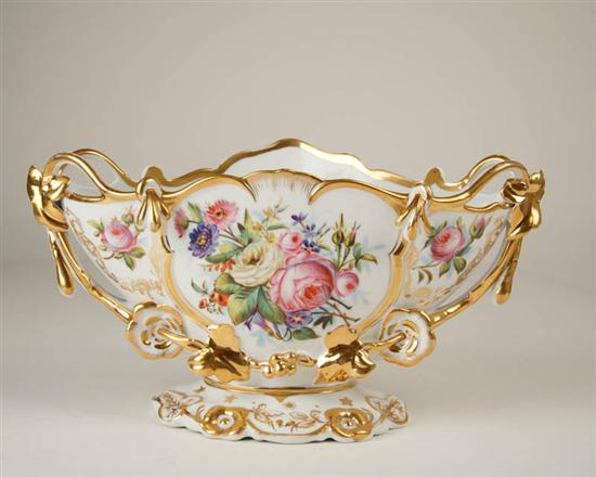 Appraisal: A Handpainted Continental Porcelain Centerpiece oval with a shaped rim