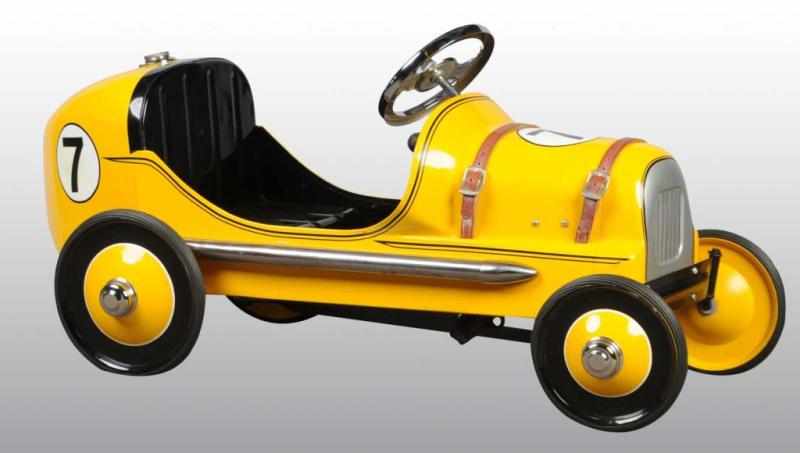 Appraisal: Pressed Steel BMC Racer Pedal Car Description Metal body painted