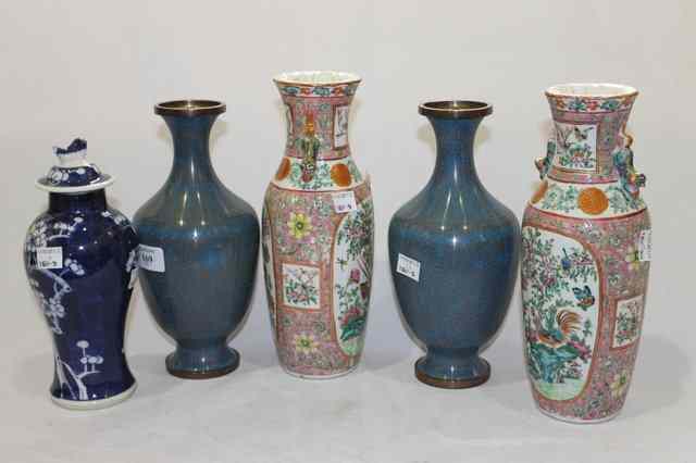 Appraisal: A PAIR OF CHINESE POLYCHROME VASES th Century a pair