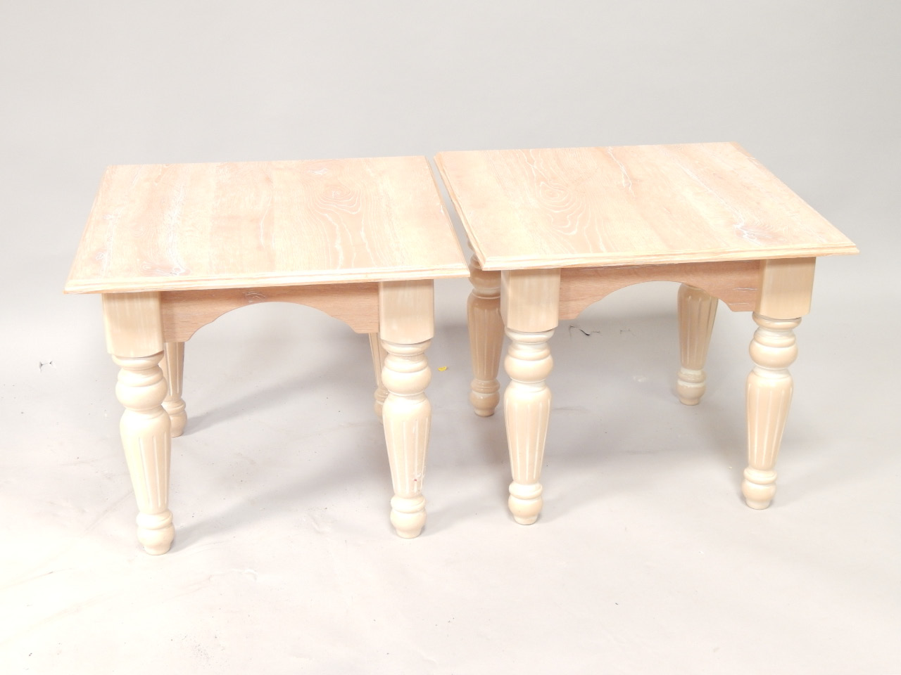 Appraisal: Twin washed beech side tables upon turned column legs cm