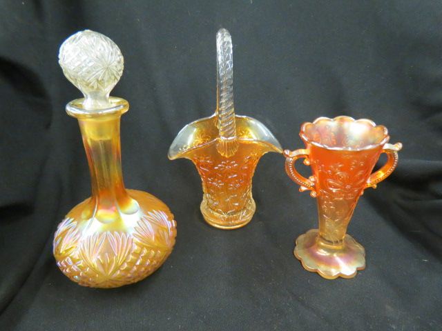 Appraisal: pcs Marigold Carnival Glass basket decanter and a handled vase