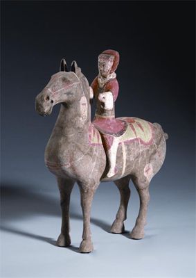 Appraisal: A Chinese unglazed black pottery and painted equestrian model Han