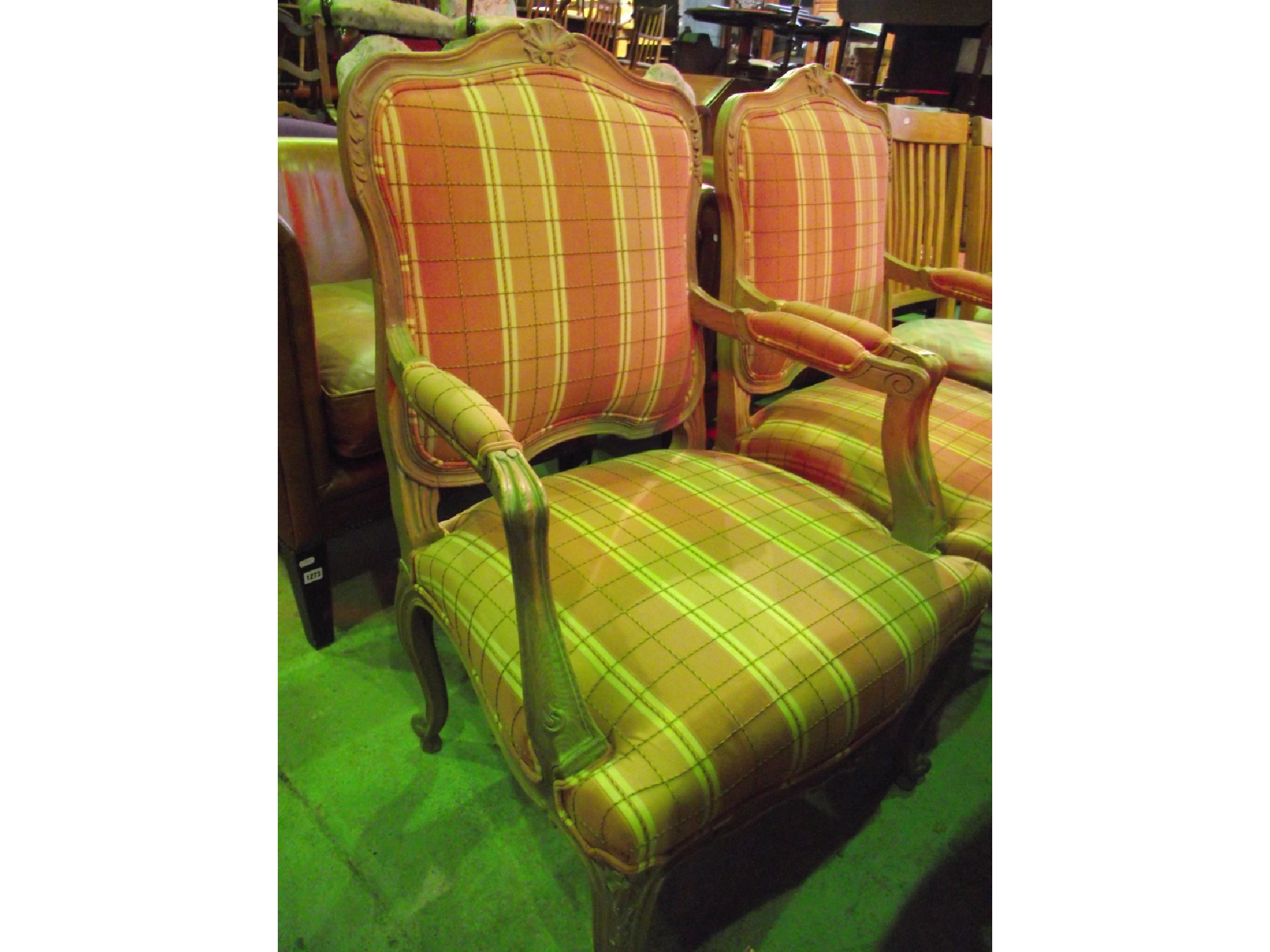 Appraisal: A pair of fauteuils with alternating shades of pink and