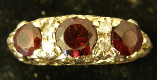 Appraisal: Ruby and diamond cluster ring on ct gold shank and