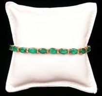 Appraisal: Ladies Emerald Bracelet Ladies emerald tennis bracelet features twenty oval-cut