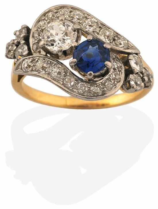 Appraisal: SAPPHIRE AND DIAMOND DRESS RING Centrally set with a claw