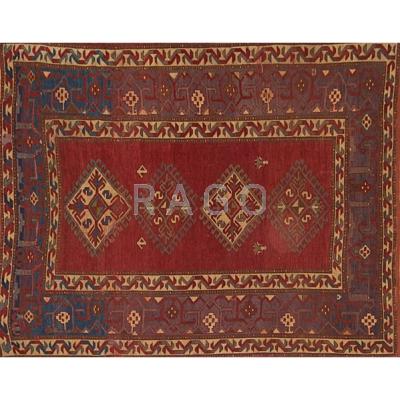 Appraisal: CAUCASIAN KAZAK Small rug with geometric design and figures on