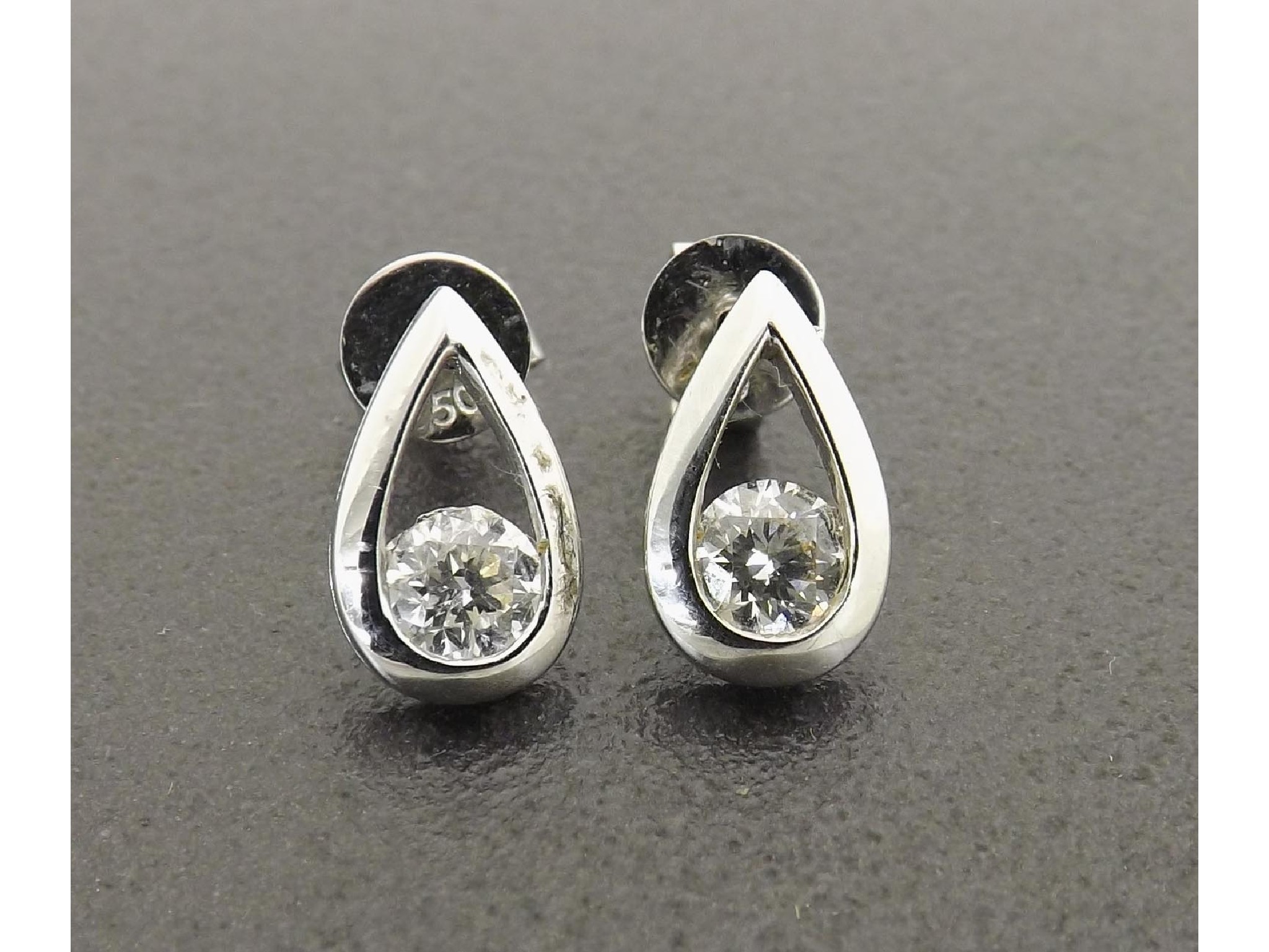 Appraisal: Pair of k white gold diamond earrings each with single