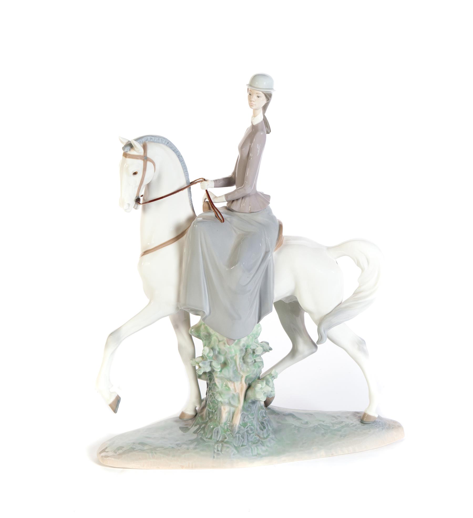 Appraisal: LLADRO FIGURAL GROUP OF WOMAN ON A HORSE Spain th