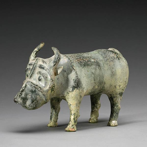 Appraisal: A green-glazed pottery model of a water buffalo Han Dynasty