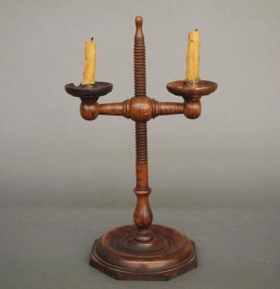 Appraisal: Adjustable wooden candlestick A late th early th century American