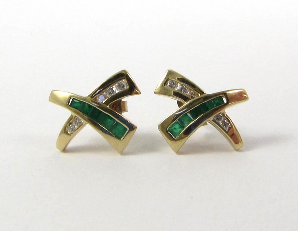 Appraisal: PAIR OF EMERALD AND DIAMOND STUD EARRINGS each X-shaped k