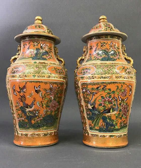 Appraisal: Pair of Asian Porcelain Covered Urns Pair of Asian porcelain