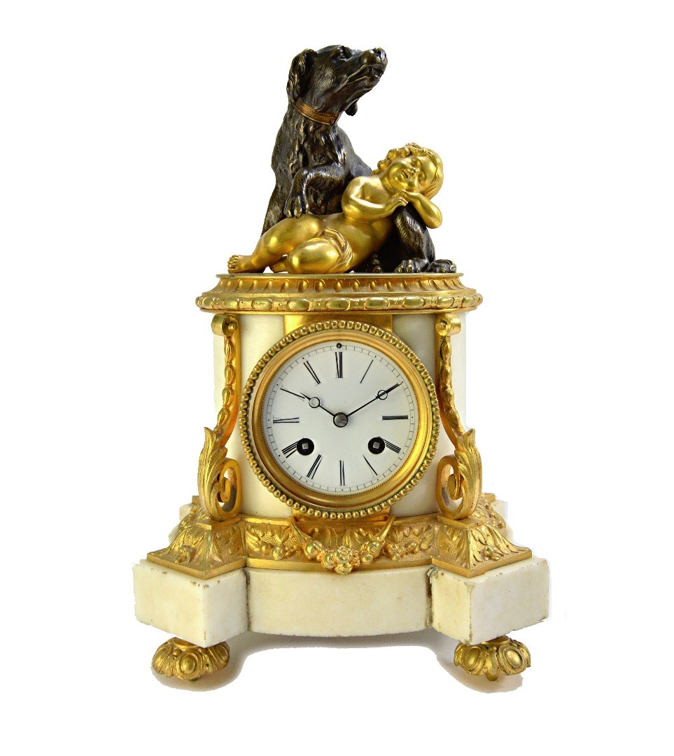 Appraisal: A French bronze gilt and white marble mantel clock late