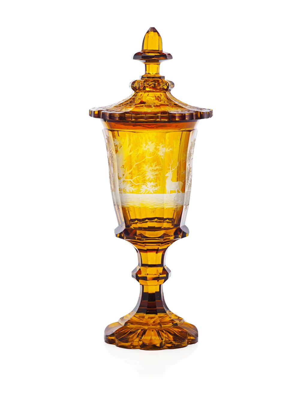 Appraisal: LARGE BOHEMIAN AMBER GLASS COVERED VASE LATE TH CENTURY the