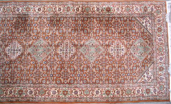 Appraisal: An Indian carpet size approximately ft in x ft in