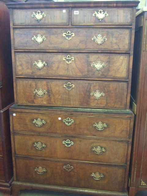 Appraisal: An early th century walnut feather banded chest on chest