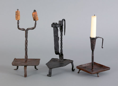 Appraisal: Three wrought iron table top lighting devices th c h