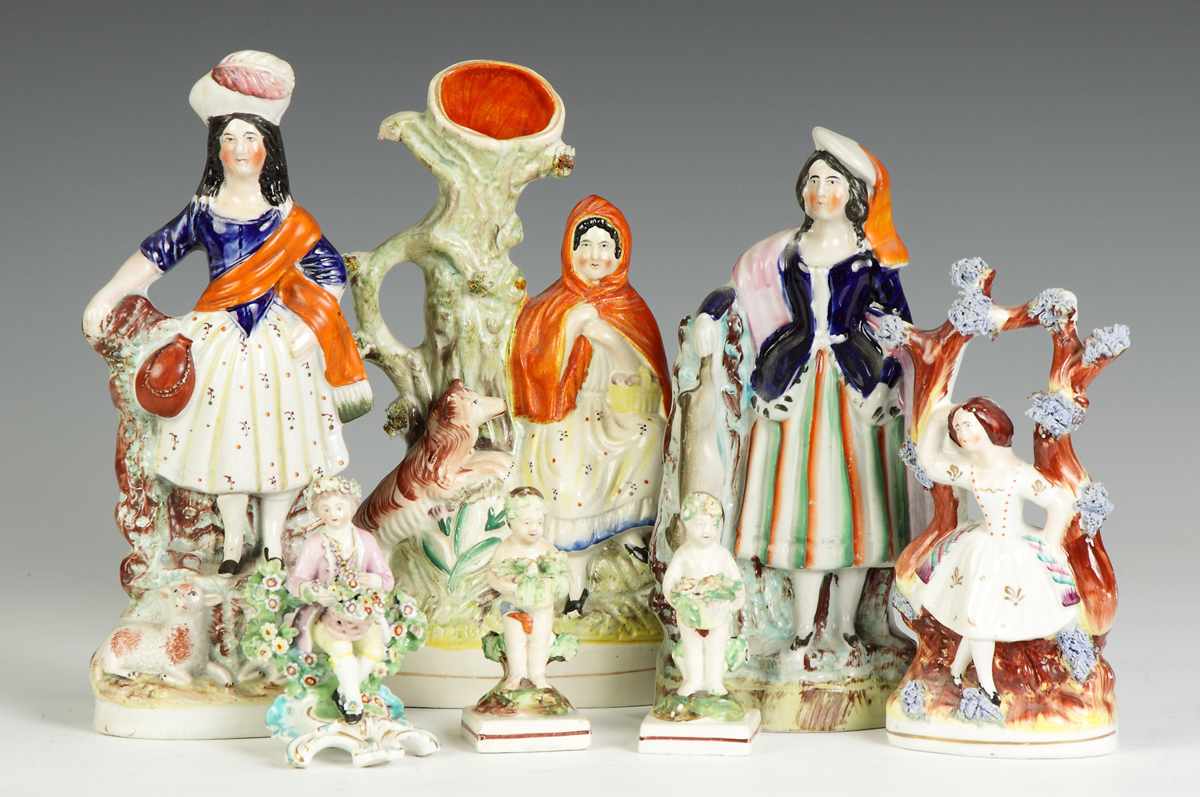 Appraisal: Group of Staffordshire th cent Back Row Shepherdess crazing Ht