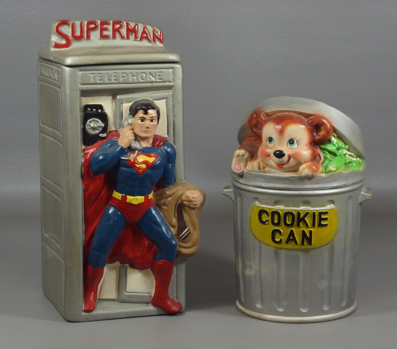 Appraisal: Ceramic cookie jars Superman with silver booth h together with