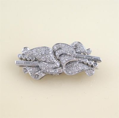 Appraisal: An Art Deco diamond set double clip brooch set overall