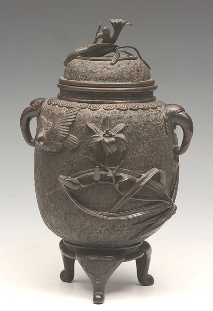 Appraisal: A JAPANESE BRONZE INCENSE BURNER with raised leaf and flower