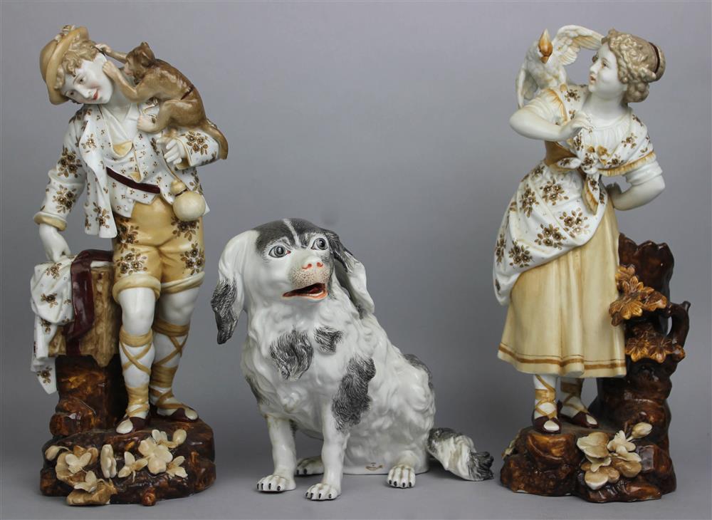 Appraisal: PAIR OF VOLKSTEDT FIGURES AND A CARL THEIME SEATED SPANIEL