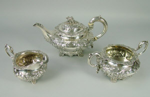 Appraisal: A Victorian silver three piece tea set London of compressed