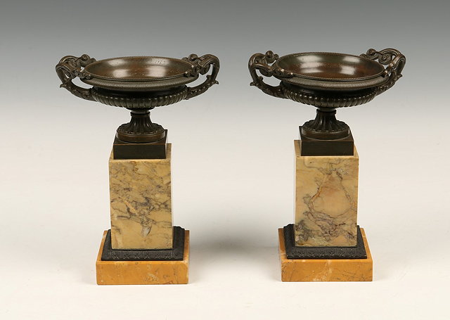 Appraisal: A PAIR OF BRONZE AND SIENNA MARBLE CLASSICAL URNS of