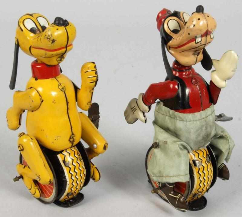 Appraisal: Lot of Tin Linemar Disney Unicyclist Toys Description Japanese Working