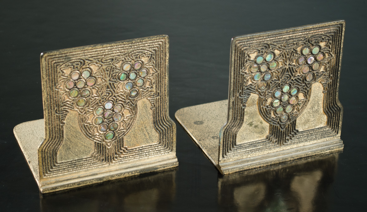 Appraisal: TIFFANY STUDIOS GILT BRONZE BOOKENDS having Art Nouveau design of