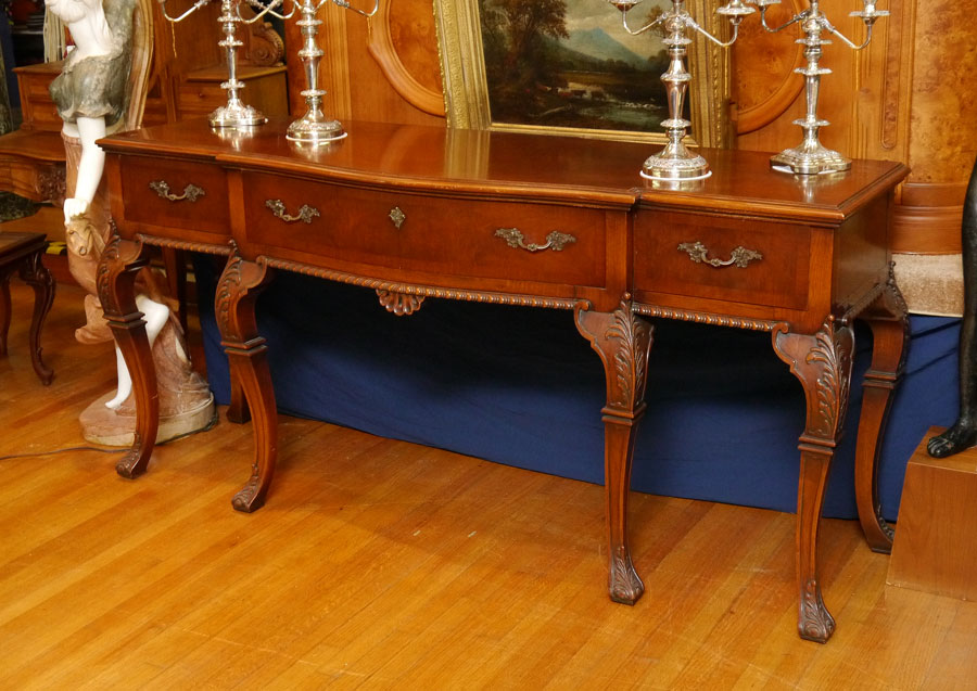 Appraisal: IRWIN FURNITURE CARVED MAHOGANY SIDEBOARD Shaped top over drawers carved