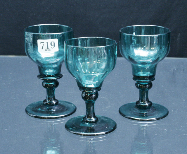 Appraisal: A set of six green tinted hand blown wine glasses