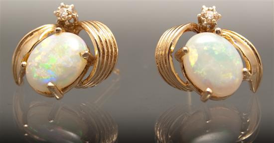 Appraisal: Pair of yellow gold diamond and opal post-earrings gold unmarked