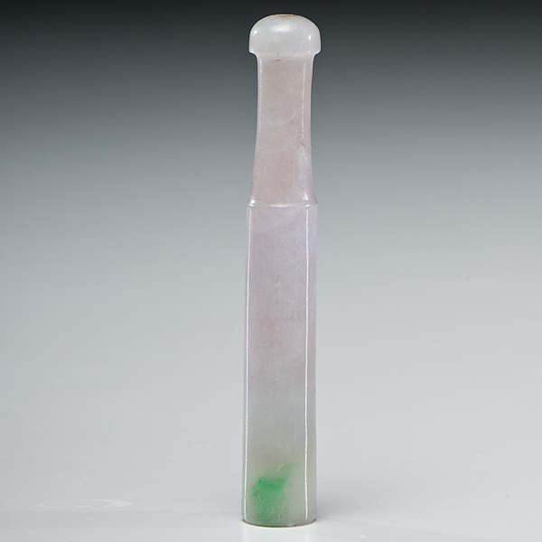 Appraisal: Chinese A carved green and white jadeite cigarette holder Lg