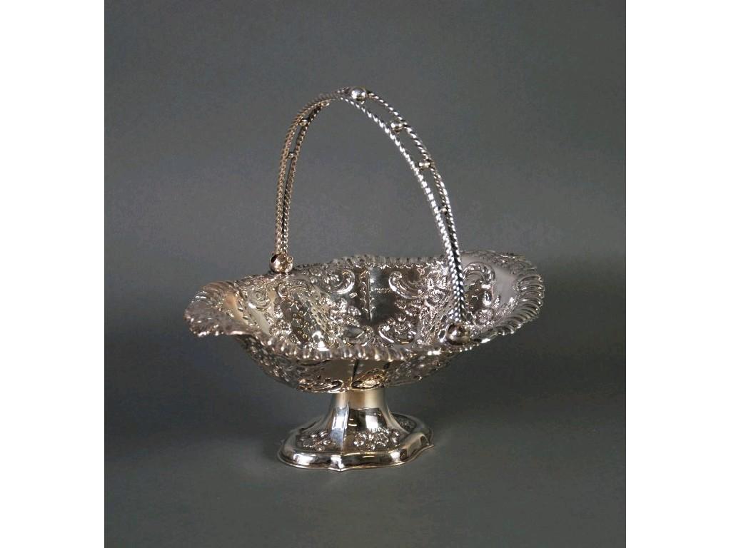 Appraisal: LATE VICTORIAN PIERCED AND EMBOSSED SILVER SWING HANDLED PEDESTAL CAKE