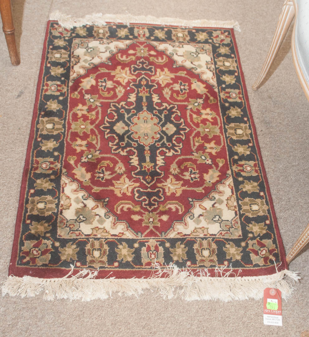 Appraisal: Small oriental style throw rug