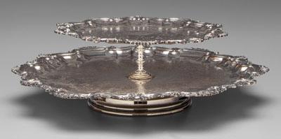 Appraisal: Silver plated two-tier lazy Susan Chippendale style stepped pedestal base