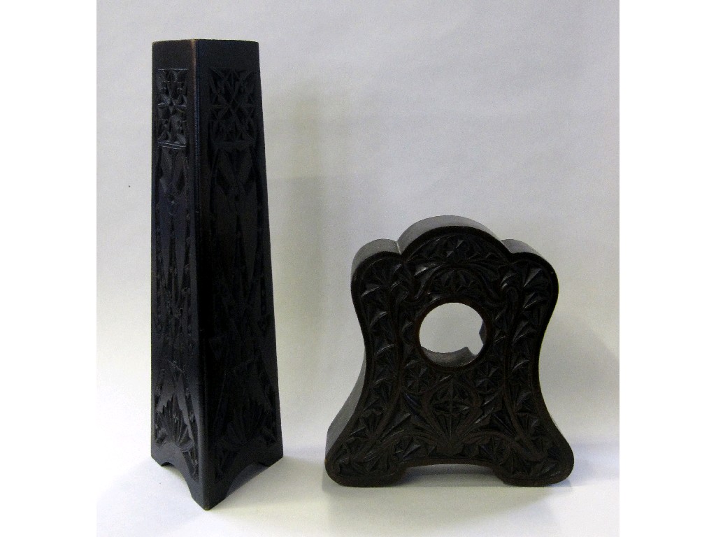 Appraisal: Carved wooden triangular shaped vase and a similar watch stand