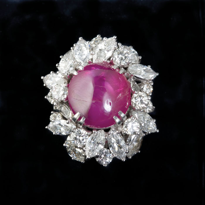 Appraisal: CABOCHON RUBY DIAMOND AND PLATINUM RING The ring set with