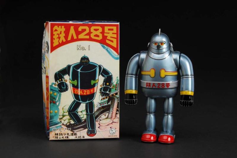 Appraisal: Tin T- Tetsujin Robot Wind-Up Toy Description Japanese Made by