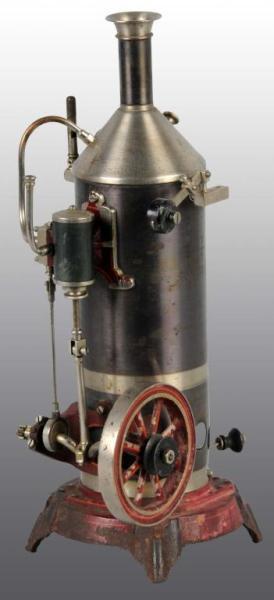 Appraisal: Falk Vertical Steam Engine Description With burner whistle and weighted