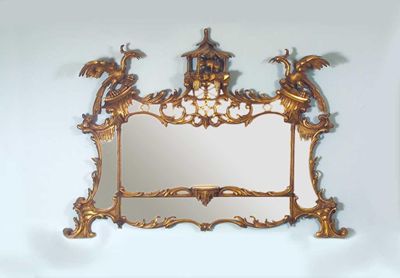 Appraisal: A th century giltwood and gesso overmantel mirror the pagoda