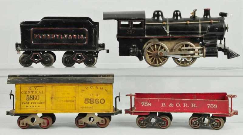 Appraisal: Cast Iron Knapp Steam Freight Train Set Description Includes engine