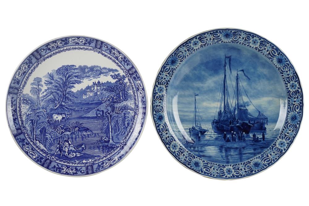 Appraisal: TWO CONTINENTAL BLUE WHITE POTTERY CHARGERSthe first Royal Delft blue