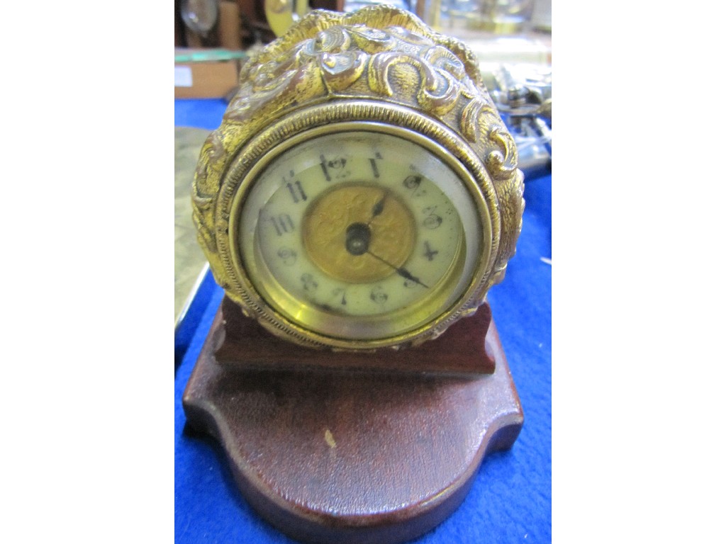 Appraisal: Gilt desk clock on oak stand