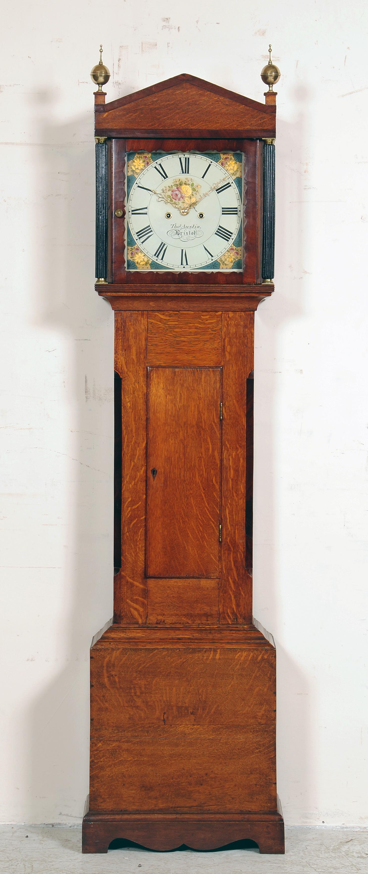 Appraisal: AN OAK LONGCASE CLOCK by Thomas Austin Bristol the eight