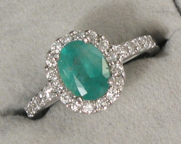 Appraisal: EMERALD DIAMOND AND WHITE GOLD RING The k white gold