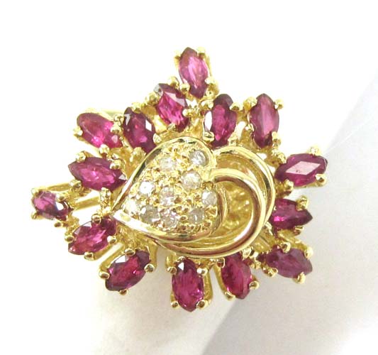 Appraisal: RUBY DIAMOND AND FOURTEEN KARAT GOLD RING with marquise-cut rubies